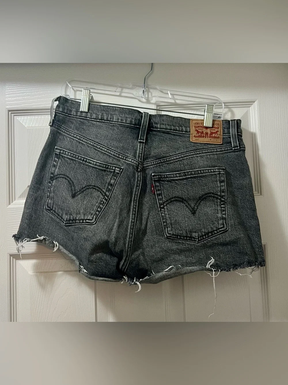 Levi’s Mid-Rise Black Denim Cutoff Shorts